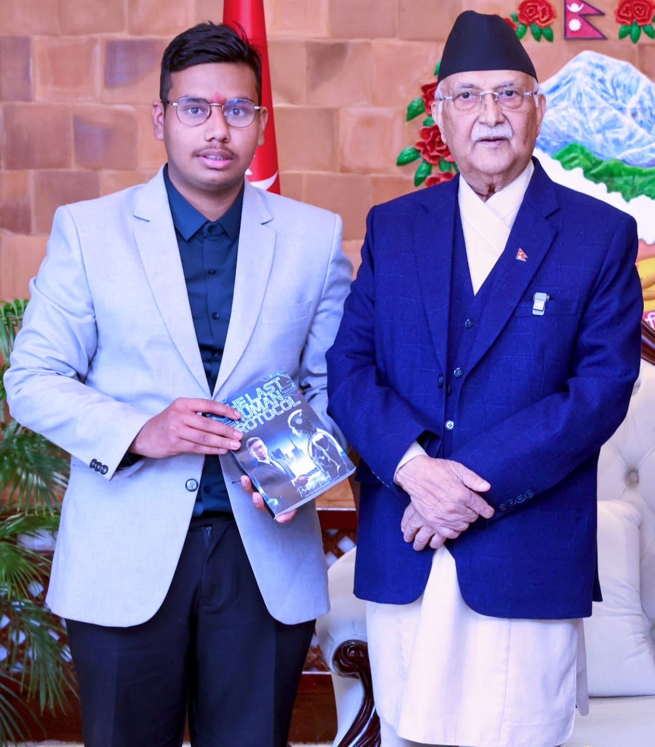 Book Handover to Prime Minister (faces not shown)